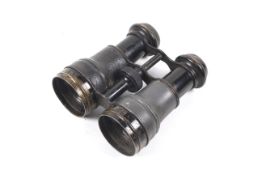 A pair of early 20th century/WWI adjustable focus aviation binoculars.