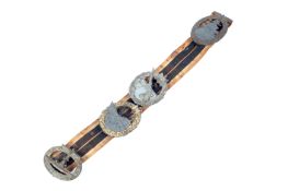 Four German WWII badges attached to a ribbon.