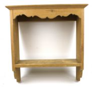 A small pine shelf. With shaped edges, H49cm x W47.
