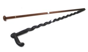 Two vintage wooden walking sticks. Including one with a handle carved as a head, Max.