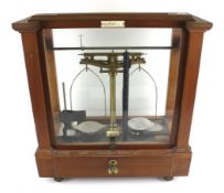 A set of vintage chemistry lab scales.