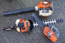 A STIHL leaf blower, EMC CS2500 Chainsaw and a STIHL HS 80 chainsaw.