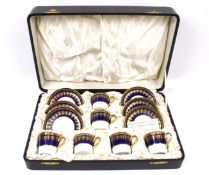 A vintage Bistro cased china coffee can and saucer set of six.