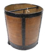 A vintage wooden and metal bound grain measure.