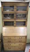 A minty oak glazed bureau bookcase.