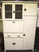 An early 20th century kitchen cupboard.