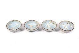 A set of four contemporary Japanese studio pottery rice bowls.