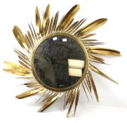 A contemporary large wall mirror.