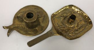 A 1900 John Pearson Newlyn brass chamberstick with embossed bird decoration,