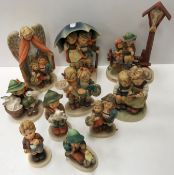 A collection of ten various Goebal Hummel figures including 