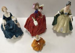 A collection of four Royal Doulton figurines including 
