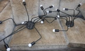 A pair of modern eight branch adjustable