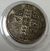 A white metal coin as a Victorian 