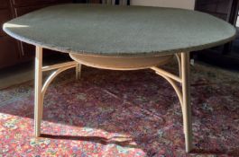 A 1930s Lloyd Loom circular dining table