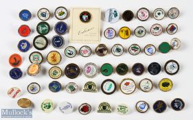 A Collection of Golf Tee Markers, a good mixed selection most are metal examples, one still on its