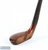R Forgan of St Andrews Crown model to the crown small compact late scared neck putter c1901 in brown