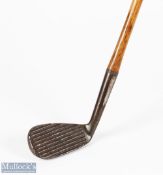 Deep wide grooved face mashie niblick - with 'flower and bee' cleek marks and indistinct marks, c/