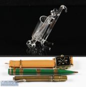 Wristwatch styled 'Domatic' Golf hole scorer together with a green Spalding pen styled golf scorer