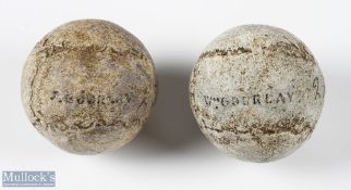 2x Replica Feather Golf Balls, ready for display