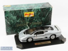 Maisto Jaguar XJ220 Diecast Model Toy: 1:12 Scale 1992 Silver on black plastic base in original box