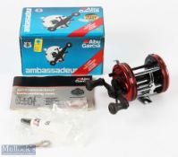 ABU Garcia Ambassadeur 6000 Multiplier Reel in red, overall very good condition with paperwork, tool