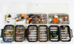 A collection of fly boxes with flies made up of: 3x one sided slim boxes with a large quantity of