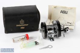 ABU Ambassadeur 5001C multiplying reel in black and chrome finish, foot stamped 730401,