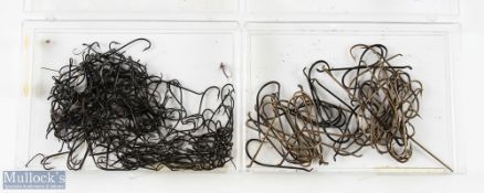 Box of 5/0 eyed salmon flies, hooks and singles (over 50); and a box of over 100 singles and doubles