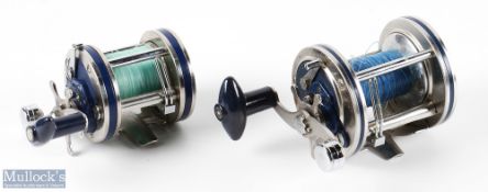 Two Olympic Dolphin Multiplier Reels models 621 LW and 625 LW, both with sliding line guides with