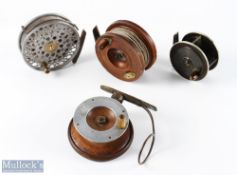 A collection of unnamed reels, all needing attention: Star back mahogany reel, missing handle;