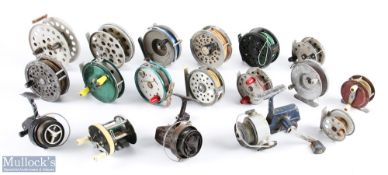 A graveyard of reels for repair or parts: made up of fly reels, centre pin and fixed spool, and