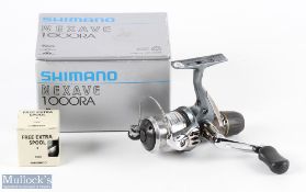 Shimano Nexave 1000RA Spinning Reel appears unused with spare spool, in makers box