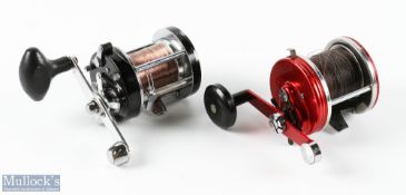 ABU Ambassadeur 9000 Multiplier Reel in red with counterbalance handle, check on/off, with another