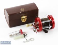Abu Ambassadeur 6000 multiplier reel, runs very well, in original case with lube and parts
