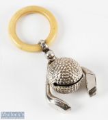 Scarce early 20th century white metal Golfing Baby Teething Ring / Rattle with ivorine teething ring
