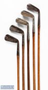 5x Maxwell flanged sole model irons incl Finnigans superior cleek, Halleys cross sword driving iron,