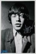Music Entertainment - The Rolling Stones - Mick Jagger - Autograph - a signed black and white