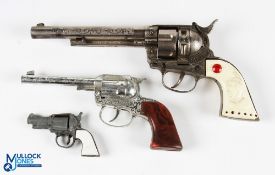 3 Vintage Metal Cap Guns, to include BCM England Sixshot cap gun, Crescent Toys Dakota cap gun and a