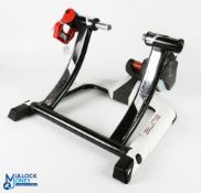 Elite Qubo Bike Digital Trainer, in used condition, looks to be missing its plug for the digital