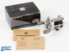 ABU Garcia Ambassadeur 6500 C3 Multiplier Reel in silver finish with sliding line guard, twin grey