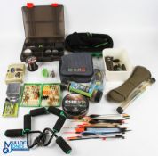 A large selection of fishing accessories, comprising: smoke grey box with compartments holding