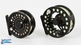 Greys GX300 4/5/6 fly reel in black with counter balance weight together with another Greys G2 fly