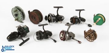 A graveyard of reels - all requiring attention for spares - made up of: 3x Mitchell fixed spool;