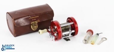 Abu Ambassadeur 6000 multiplier reel, side tensioner, white counter balanced handle, no seat