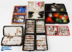 A collection of 6 fly cases and one fly zipped wallet - with a huge selection of wet and dry