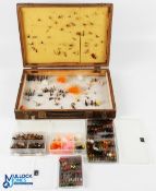 A collection of fly boxes with flies, comprising: a large wood double sided box 13