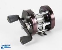 ABU Ambassadeur 5000D multiplying reel in two tone purple and green finish, foot stamped 740800,