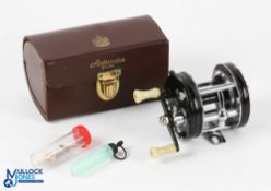 ABU Ambassadeur 5000C Multiplier Reel in black finish, with twin handles and sliding line guide,