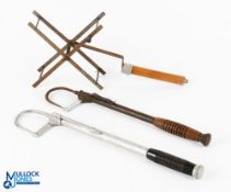 Fishing equipment, made up of: 2x single draw gaffs, one with wood handle, one with a plastic