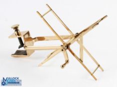 A large brass folding line winder/dryer with large C clamp, strait crank handle and arm with folding